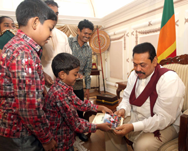 Derana Little Star presents debut CD to the President